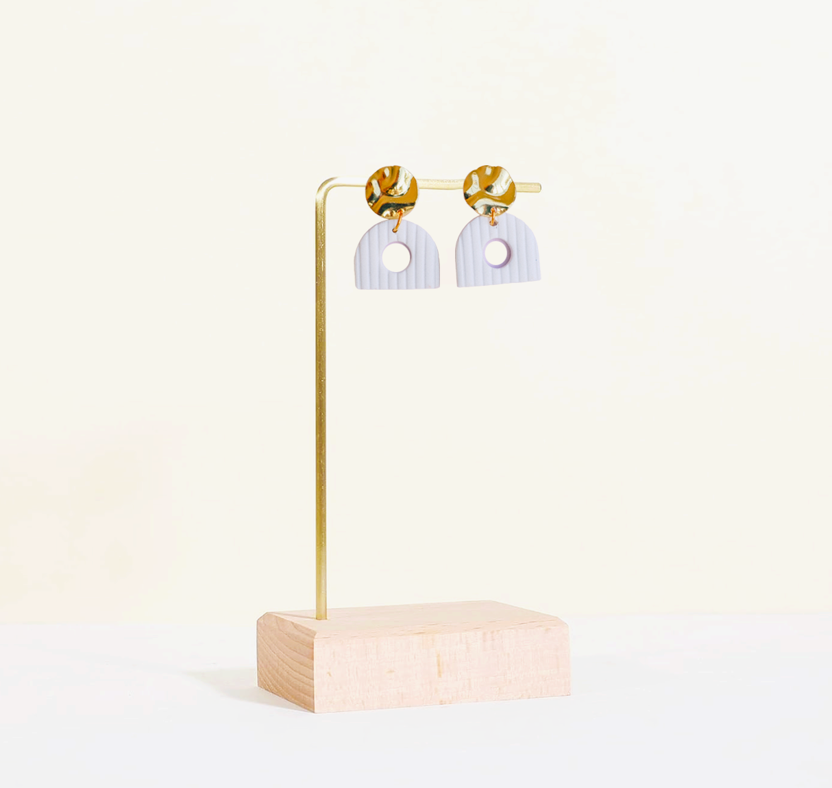the nia | gold and white