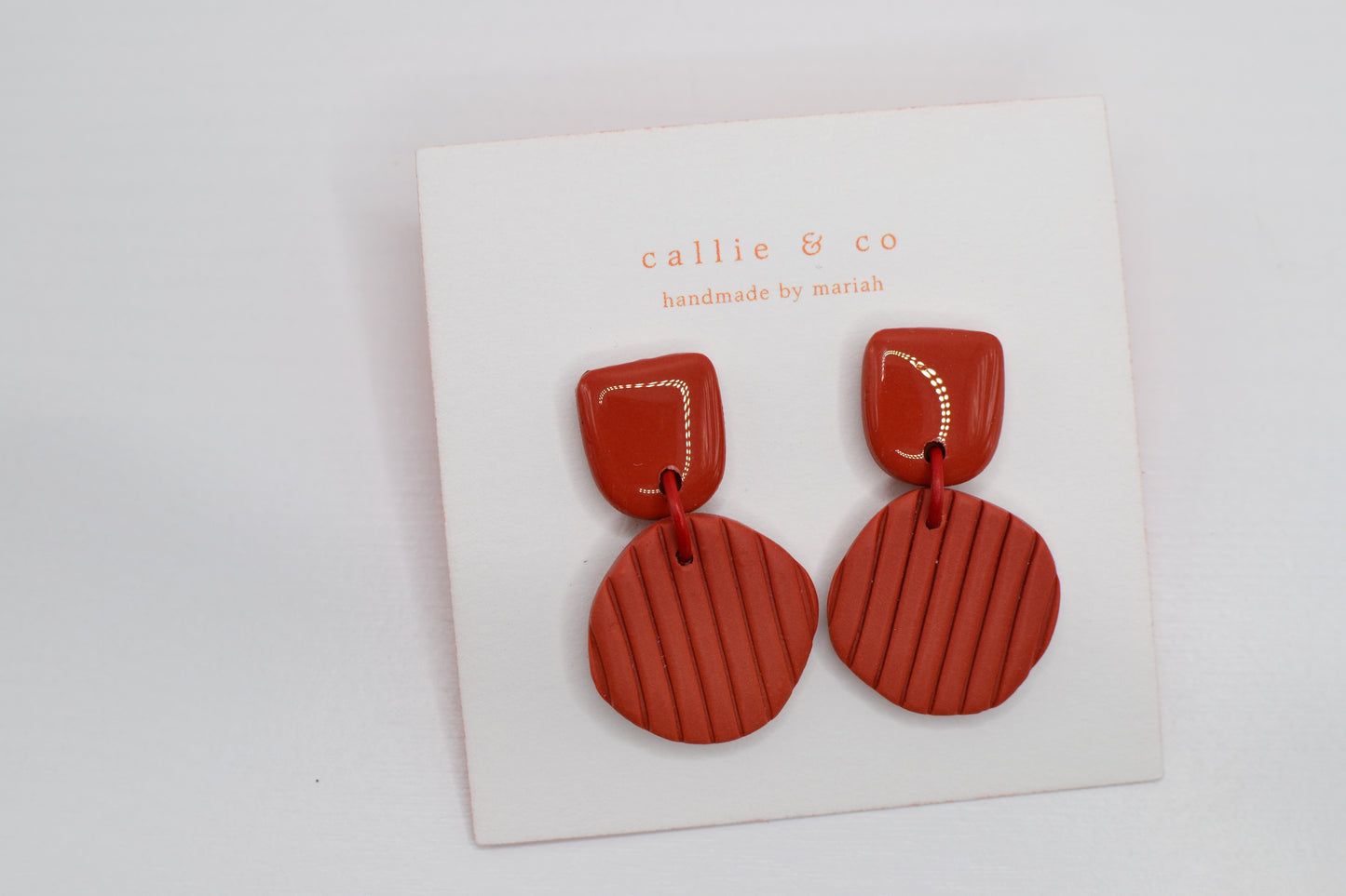 the red collection | shiny ribbed statement earrings